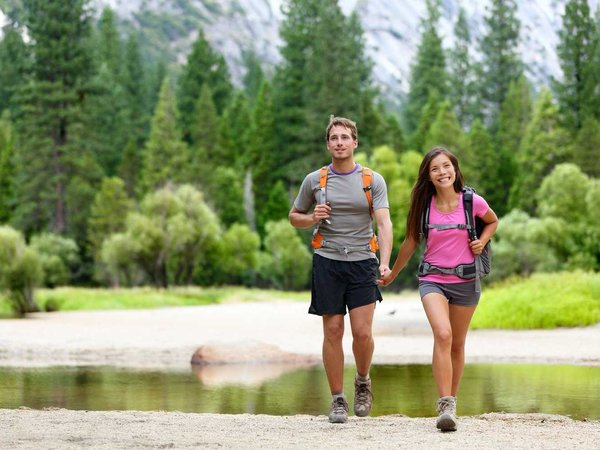 Hiking people on hike in mountains in Yosemite