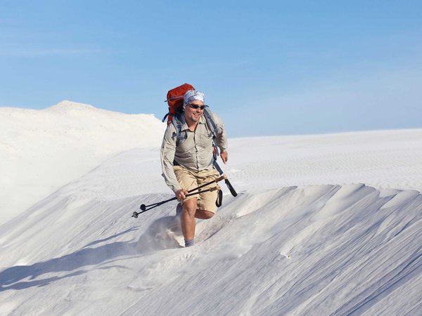 The journey in the desert on the white dunes.