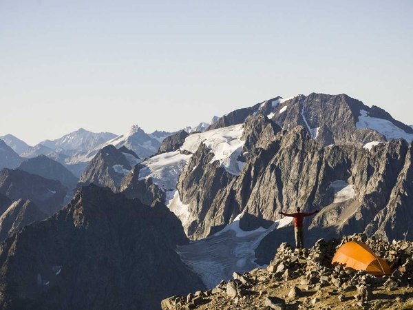 Man Hiking On The Sahale Arm, North Cascades National Park, Washington, Usa