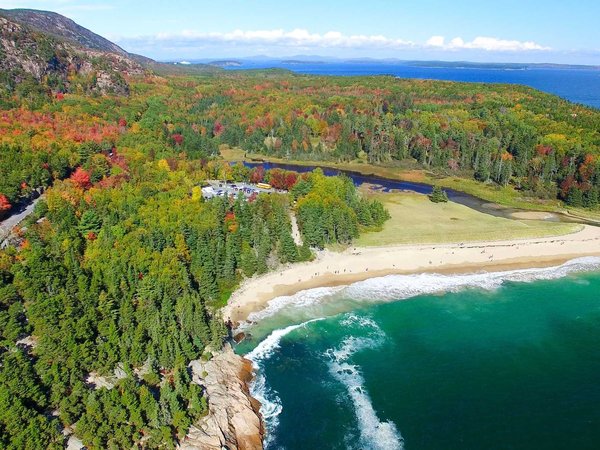 Beautiful fall colors of Acadia, Maine. Aerial view from helicopter
