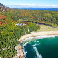 Beautiful fall colors of Acadia, Maine. Aerial view from helicopter