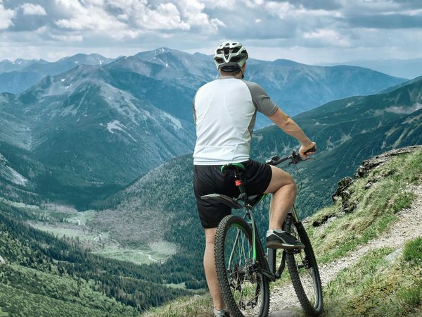 A person can enjoy beautiful sights while riding trails on his mountain bike
