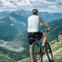 A person can enjoy beautiful sights while riding trails on his mountain bike