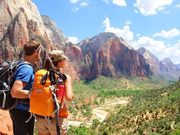 A couple of responsible tourists admire the view over Zion National Park