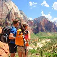 A couple of responsible tourists admire the view over Zion National Park