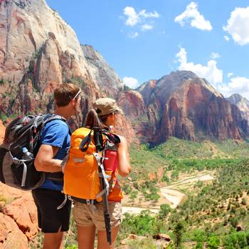 A couple of responsible tourists admire the view over Zion National Park