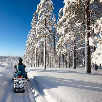 Traveling Lapland with snowmobile